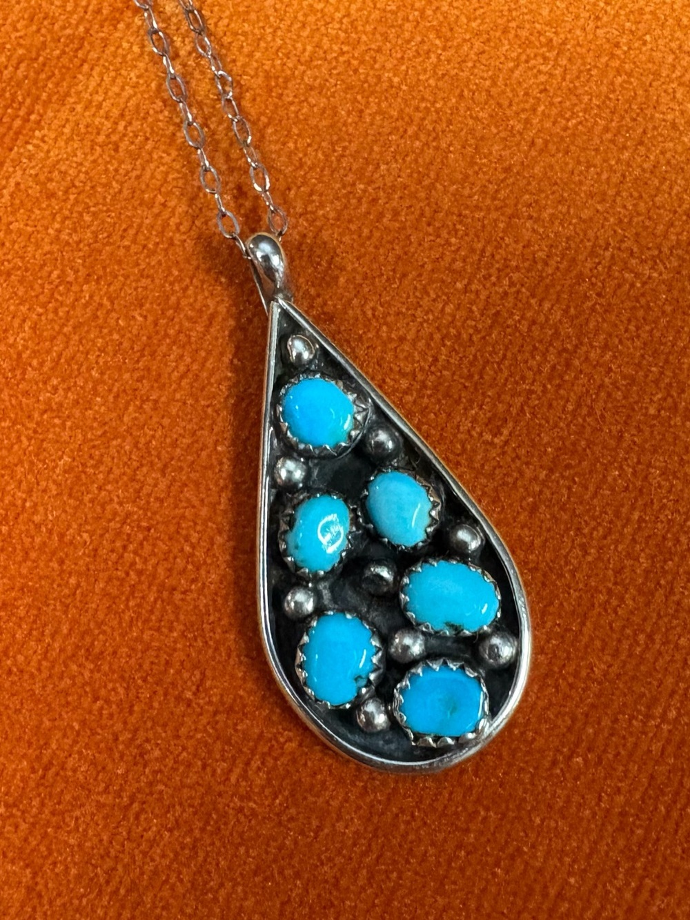 Vintage turquoise/sterling silver pendant on 18” silver chain. Great condition